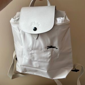 Longchamp backpack small in chalk color . Super cute and perfect for the season